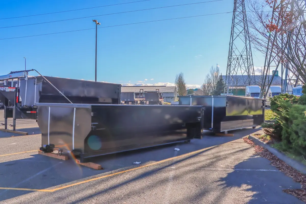 Roll-off dumpster ready for waste disposal at job site for 3 Yard Dumpster Rental in Sheridan